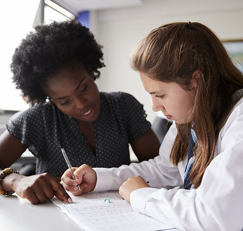 Teacher Helping Student