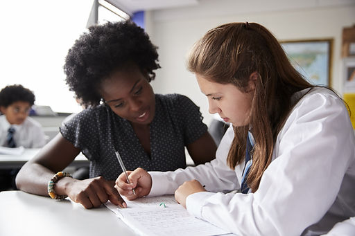 Teacher Helping Student