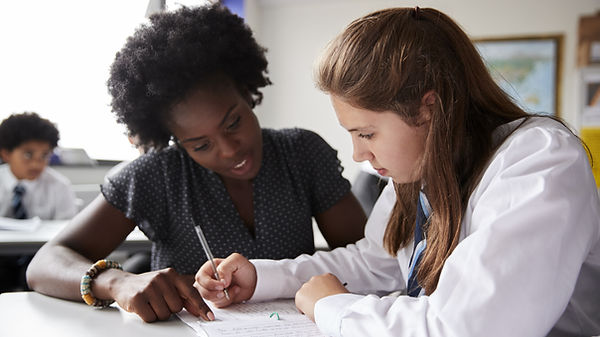 Teacher Helping Student