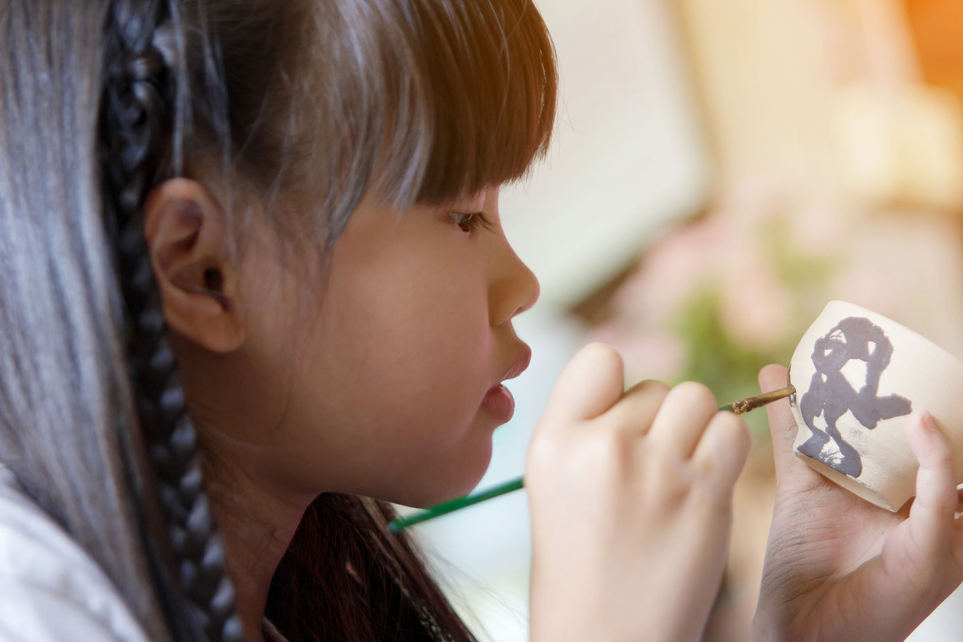 Child Drawing On Cup