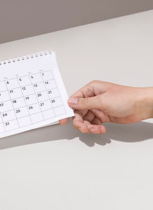 Hand Holding Calendar