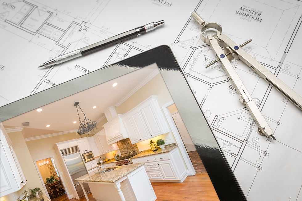 an architectural blueprint with a drafting pencil, a compass, and a tablet displaying a photo of a modern white kitchen
