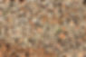 Close-up view of a stack of timber logs.