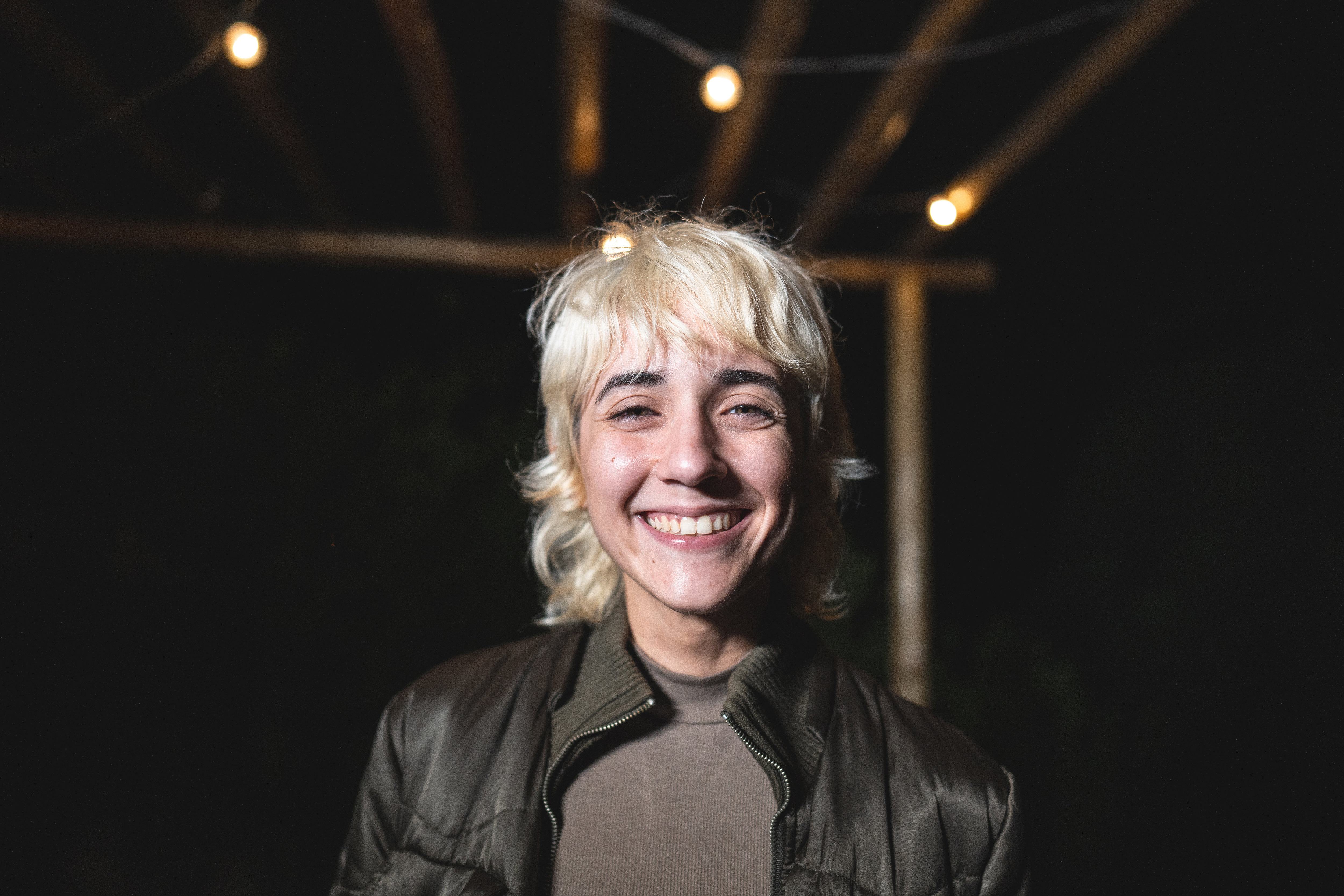 Smiling Person at Night