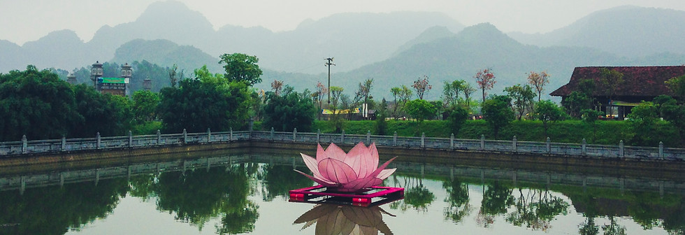 Floating illuminated lotus lantern on a lake in Vietnam