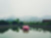 Floating illuminated lotus lantern on a lake in Vietnam