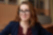 Smiling woman wearing glasses