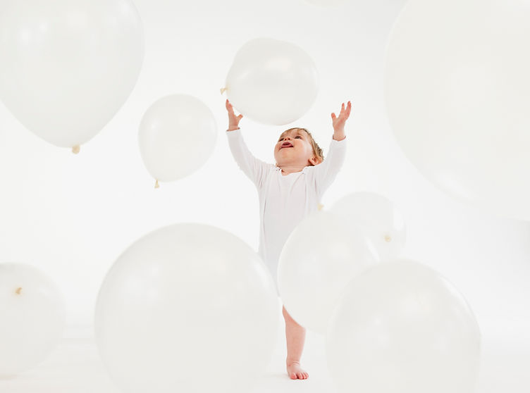 Playing with White Balloons