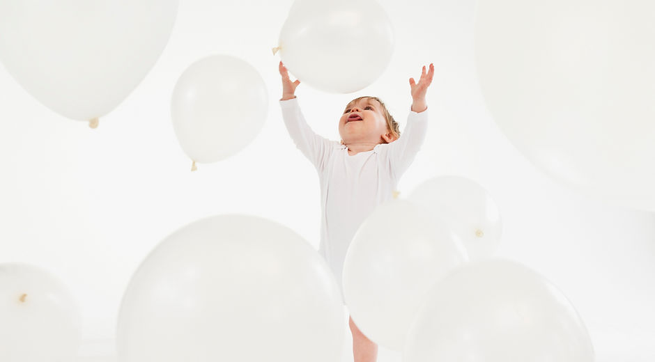 Playing with White Balloons