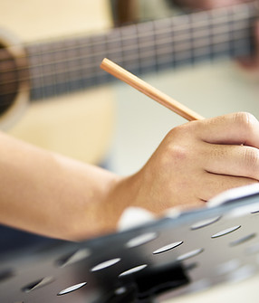 Guitarist Writing Song