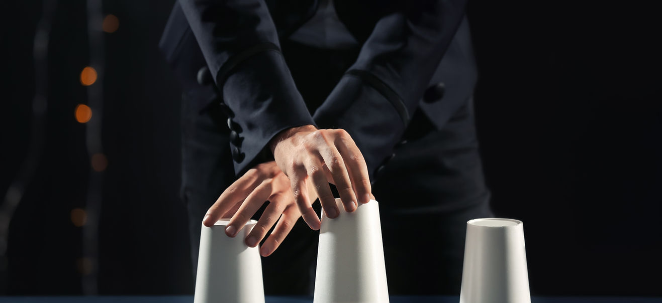 Hands Shuffling Cups