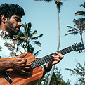Man Playing Guitar