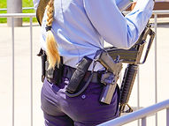 Policewoman with Guns