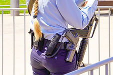 Policewoman with Guns