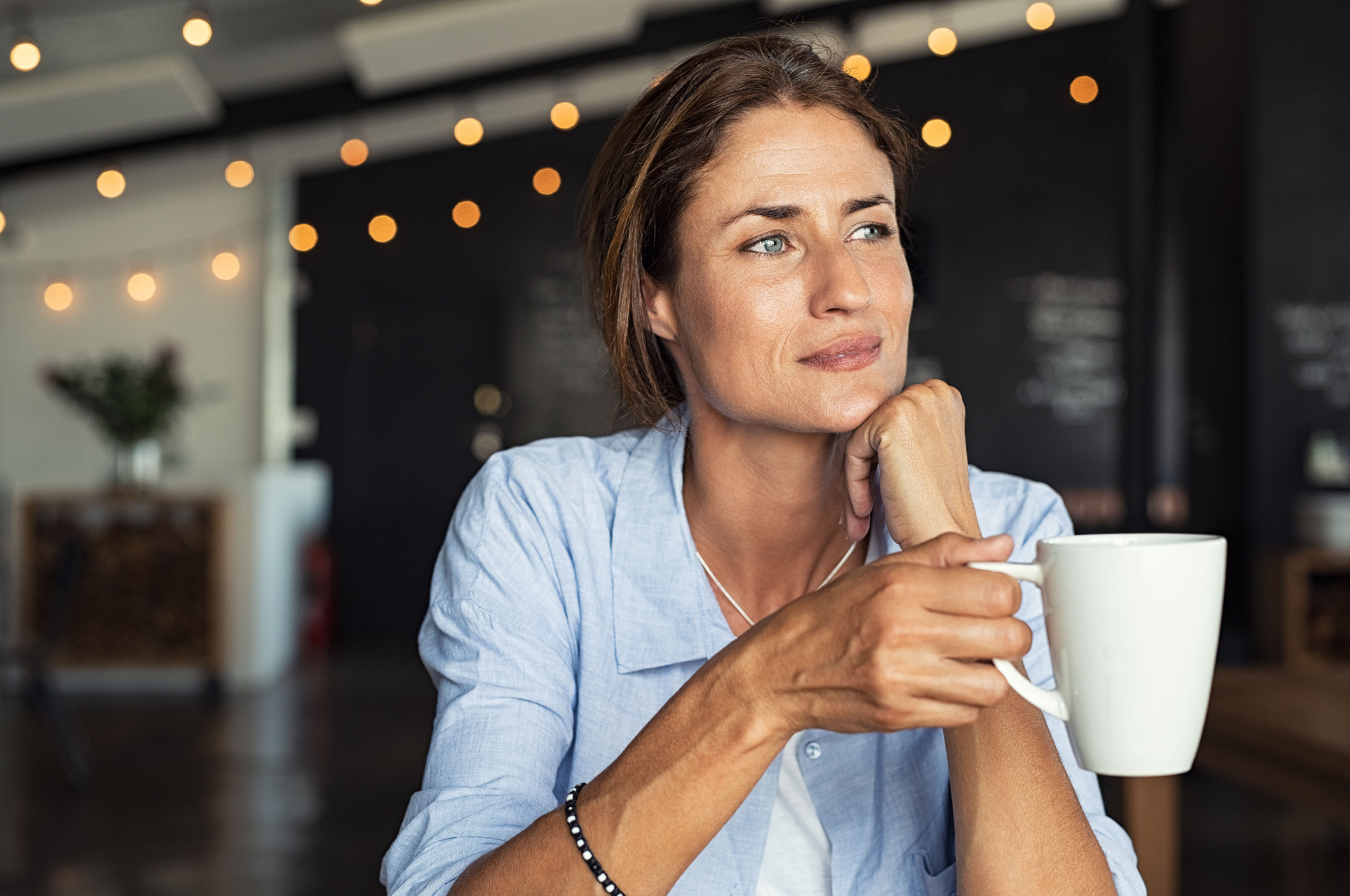 Lady drinking coffee considering whether she needs probate.