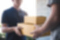 Delivery mail man giving parcel box to recipient