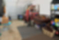 A messy and cluttered garage used as storage for clutter that has been collected