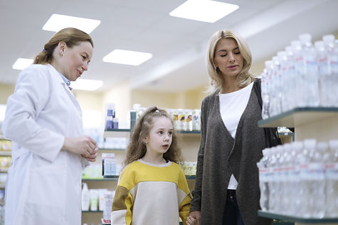 Mother and Daughter at Pharmacy
