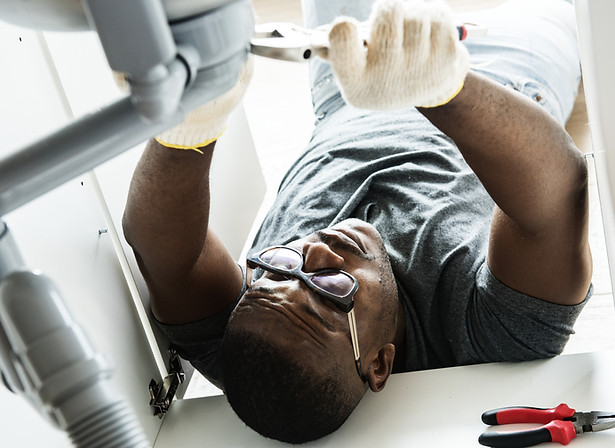 Plumber at Work | NXG Home Services