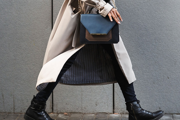 A woman in a coat walking