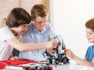 The Qubit Bot Robotics Team: Outreach Initiatives to Promote STEM and FIRST