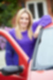 Teenage Girl Standing Next To Car Holding Key