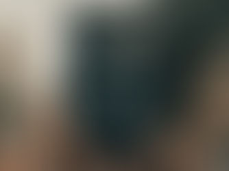 protester raises sign that depicts a fist and reads Say Their Names Black Lives Matter