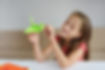 Girl Holding Origami