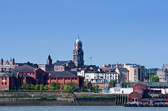 Birkenhead skyline across the Mersey from Liverpool. England