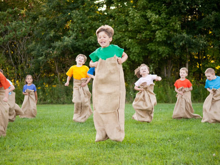 Children are playing sack race
