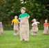 Children are playing sack race