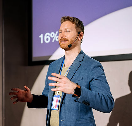Speaker Presenting on Stage
