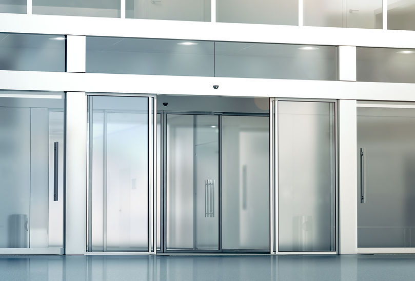Blank sliding glass doors entrance mockup, 3d rendering. Commercial automatic slide entry