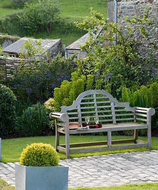 bench in a large, countryside garden