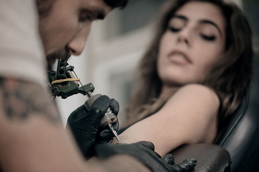 Girl Getting Arm Tattoo