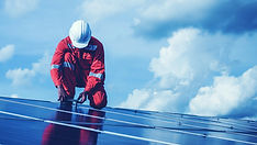 Engineers servicing solar energy plant