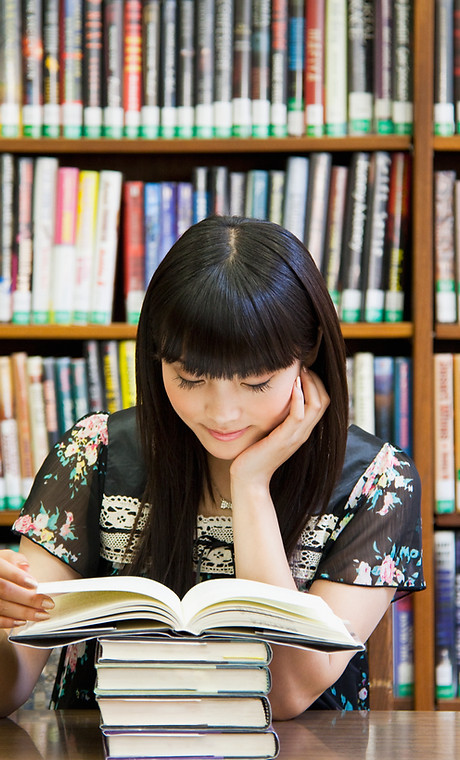 Reading Books in Library