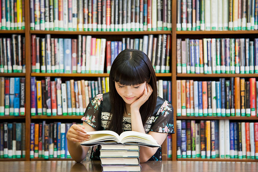 Reading Books in Library