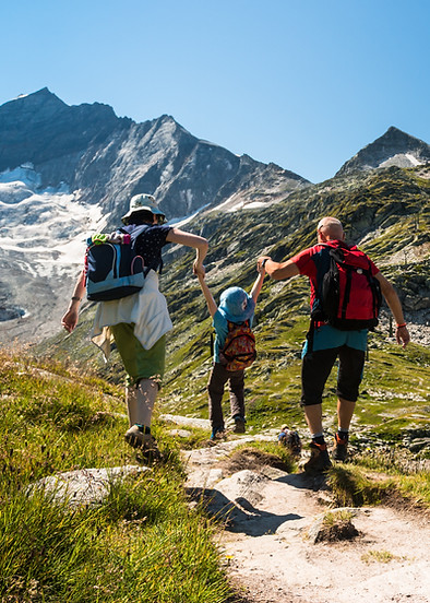 Family hiking in the mountains