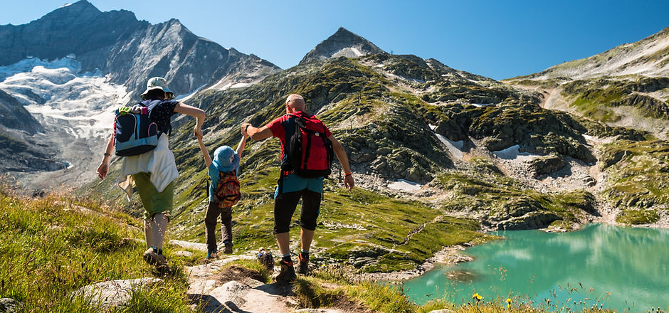 Family hiking in the mountains