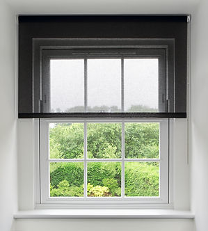 a high quality white wood framed sash window set in a cove in the attic of an expensive ne