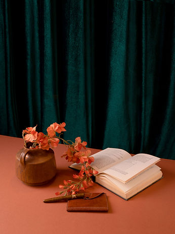 Book and Synthetic Flowers