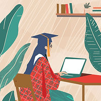 Graduate Using Laptop