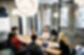 Group of young business owners receiving company setup advice.