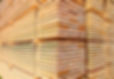 Stack of new wooden studs at the lumber yard
