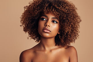 Beautiful girl with curly hairstyle