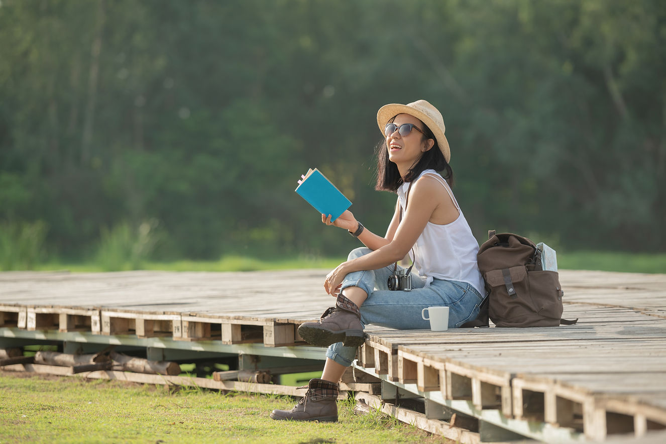 Woman Reading Outdoors