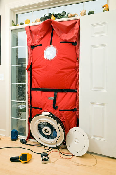 Blower door and test equipment set up for home energy audit