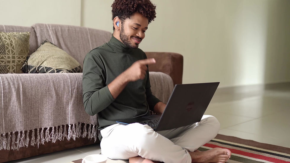 Man Video Chatting and Signing