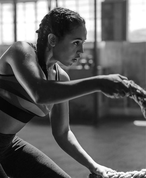 Woman Exercising Ropes
